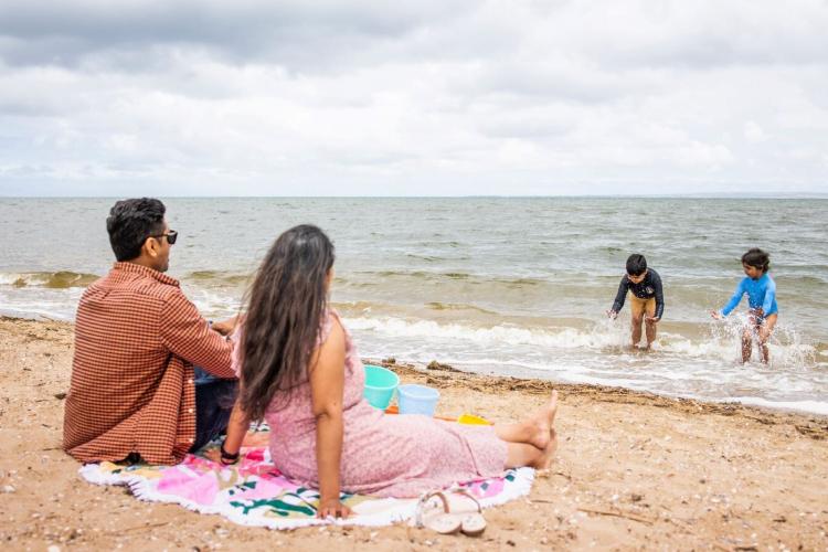 Family enjoying the beach at Werribee South Foreshore