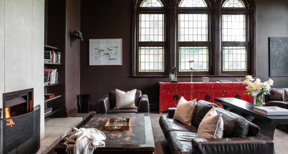 A couch and coffee table in lounge area of Lancemore Mansion Hotel Werribee Park